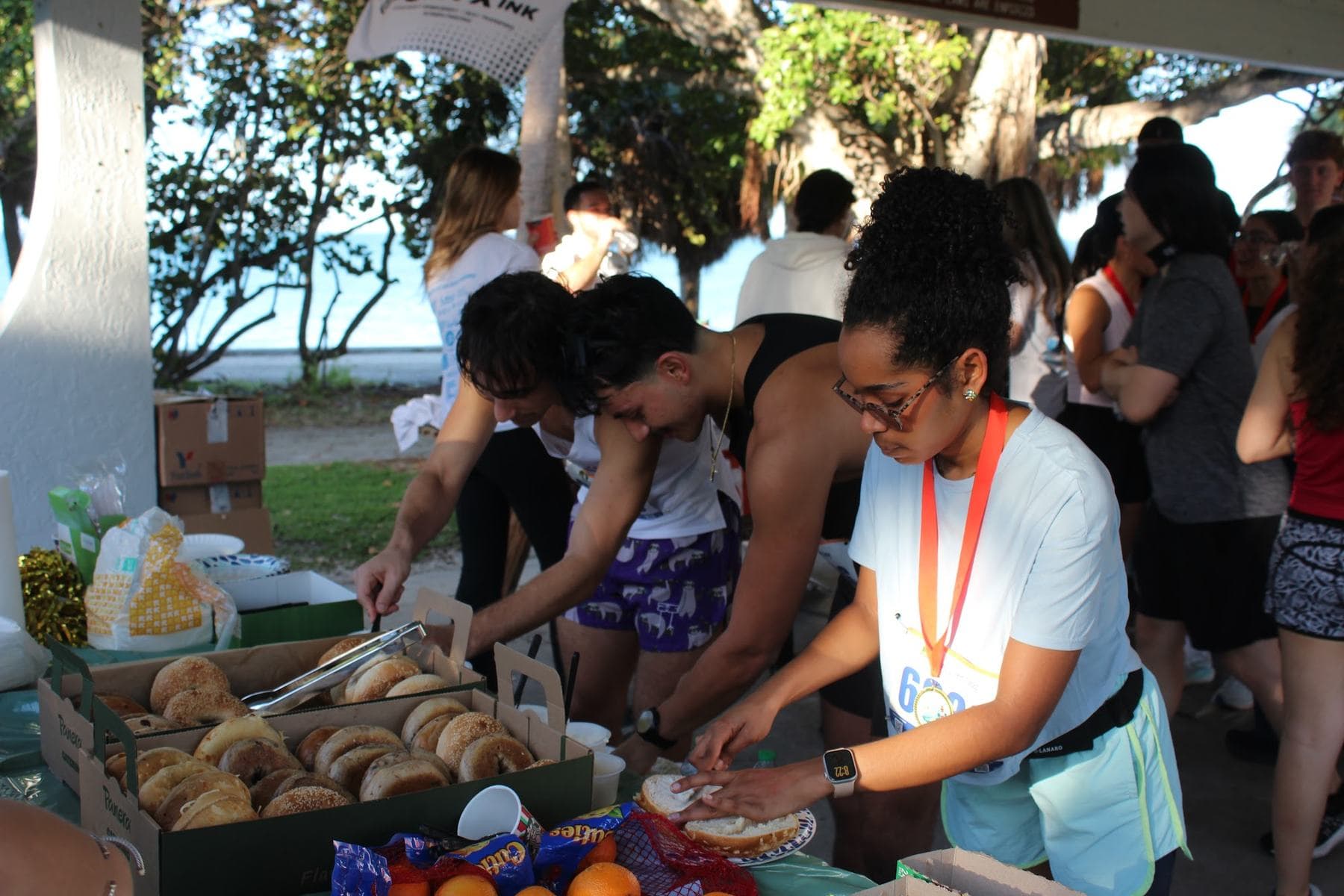 Runners helping themselves to the post-race breakfast